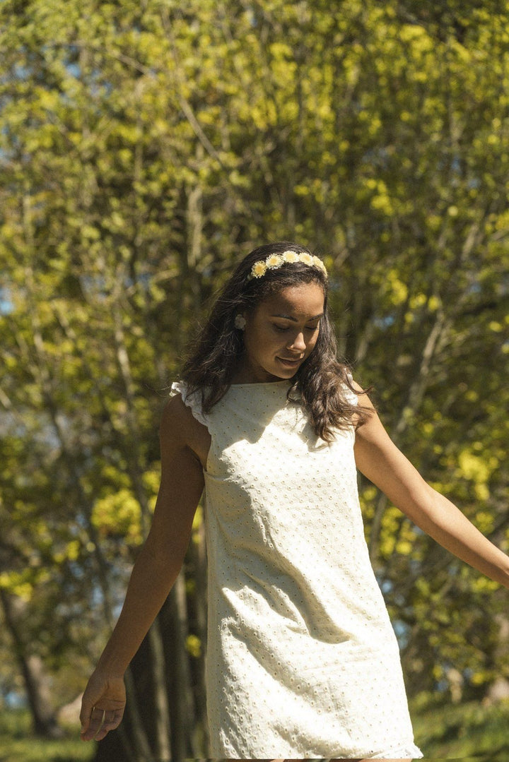 Lemon broderie anglaise mini reversible dress with a detachable black bow Dress Hannah Sophia England 