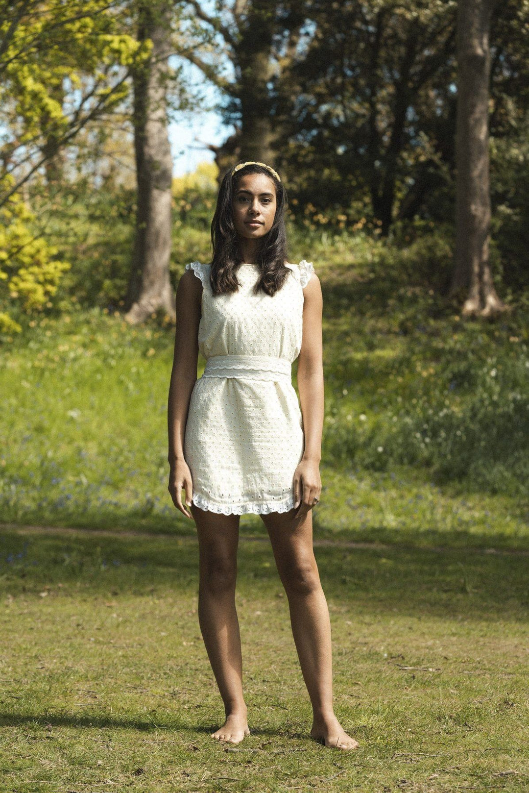 Lemon broderie anglaise mini reversible dress with a detachable black bow Dress Hannah Sophia England 