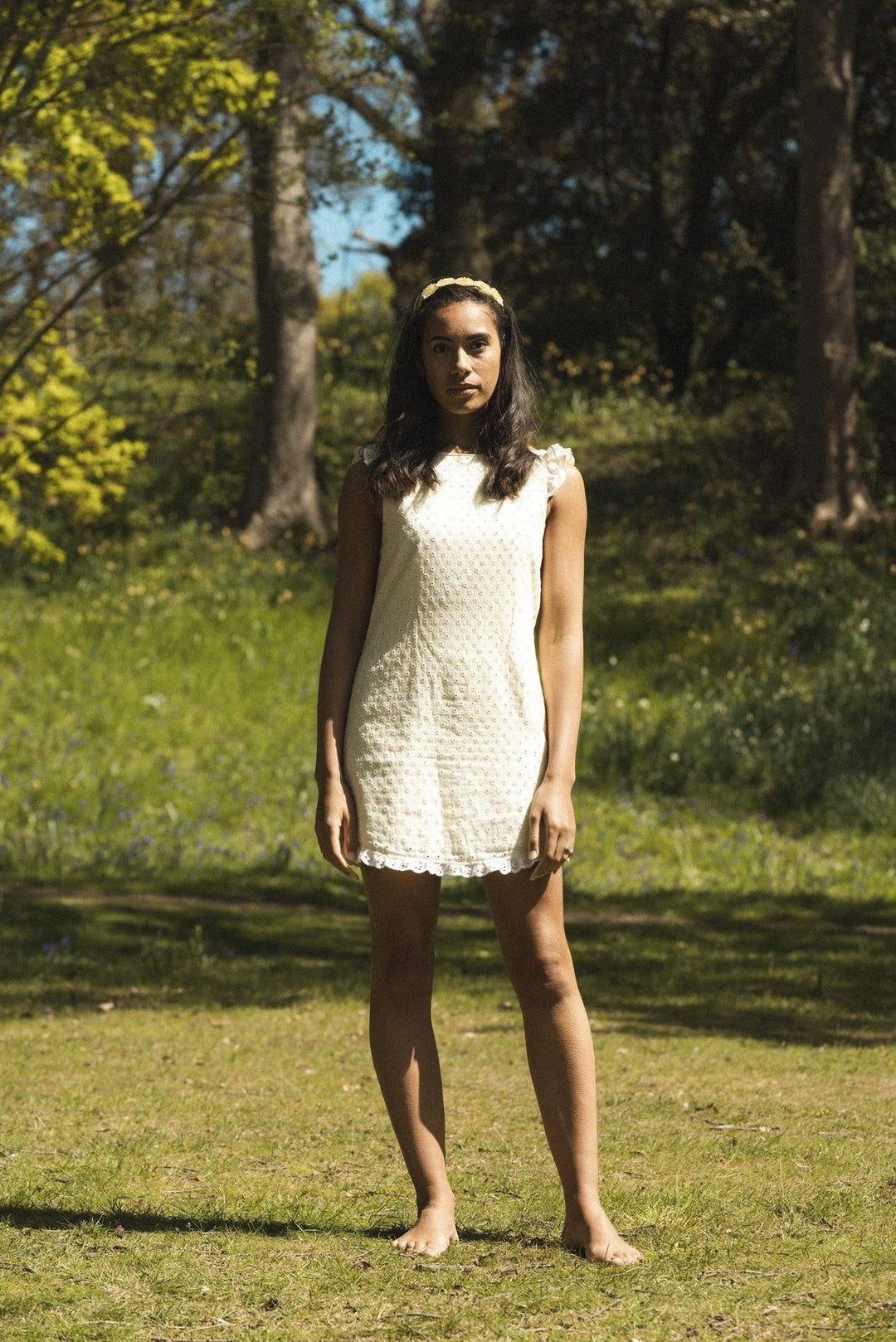 Lemon broderie anglaise mini reversible dress with a detachable black bow Dress Hannah Sophia England 