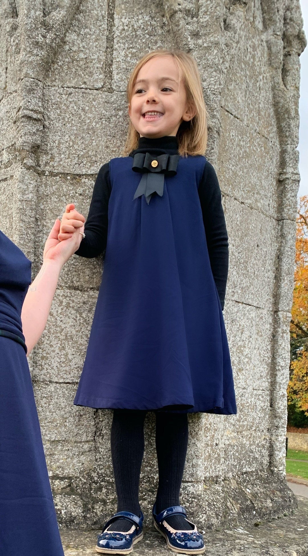 Matilda navy and green checked reversible pinafore with a detachable bow Hannah Sophia England 