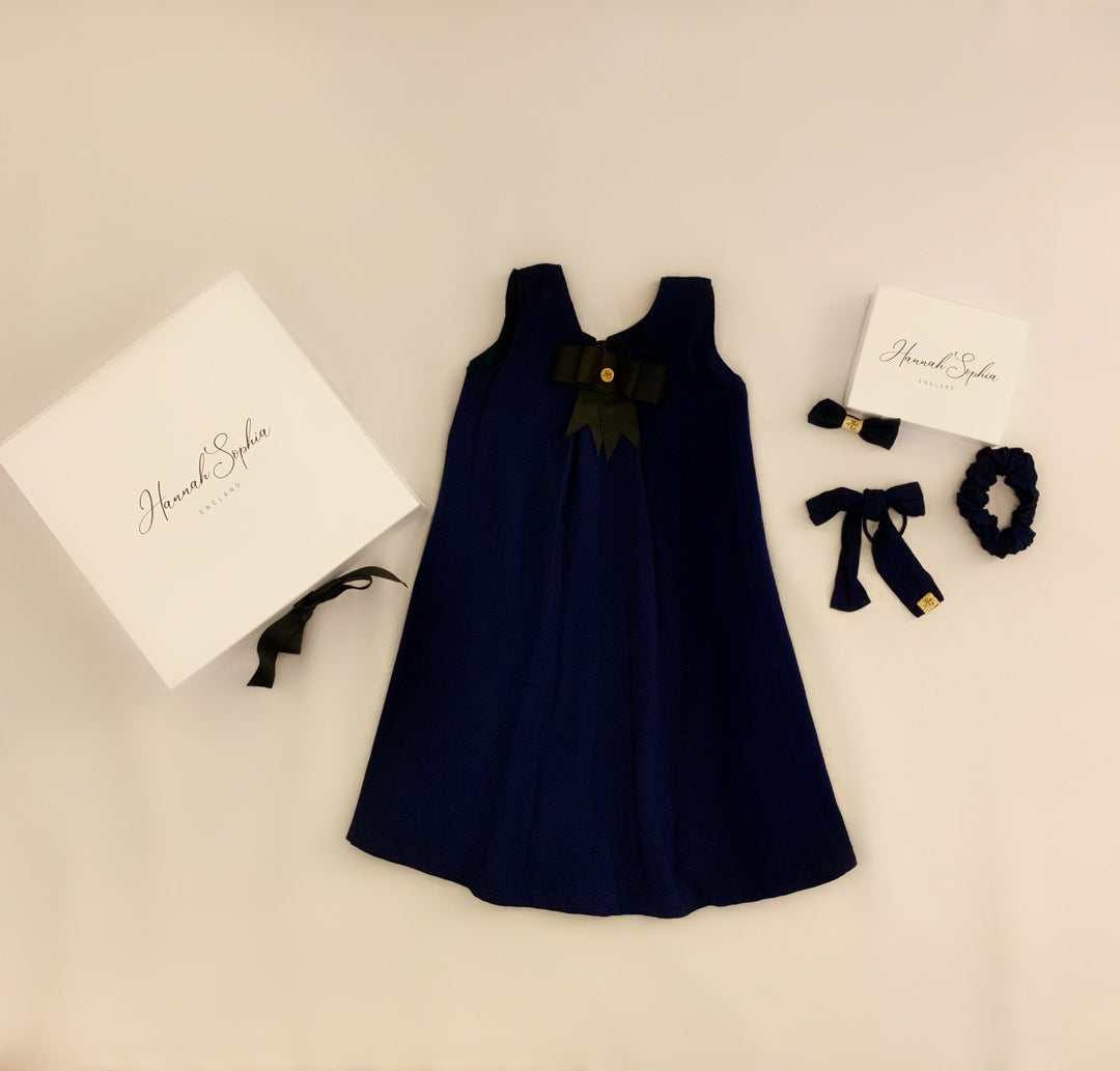 Pre-Order Matilda navy and blue checked reversible pinafore with a detachable bow Hannah Sophia England 