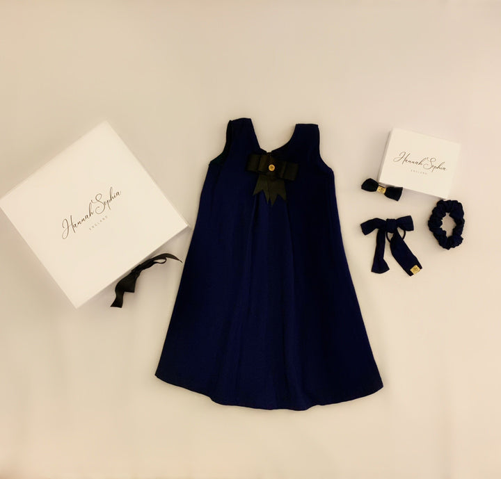 Pre-Order Matilda navy and blue checked reversible pinafore with a detachable bow Hannah Sophia England 